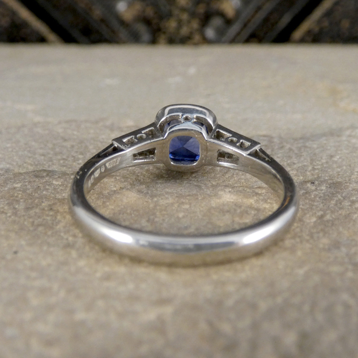Back view of Sapphire ring showing the settings and plain polished band.