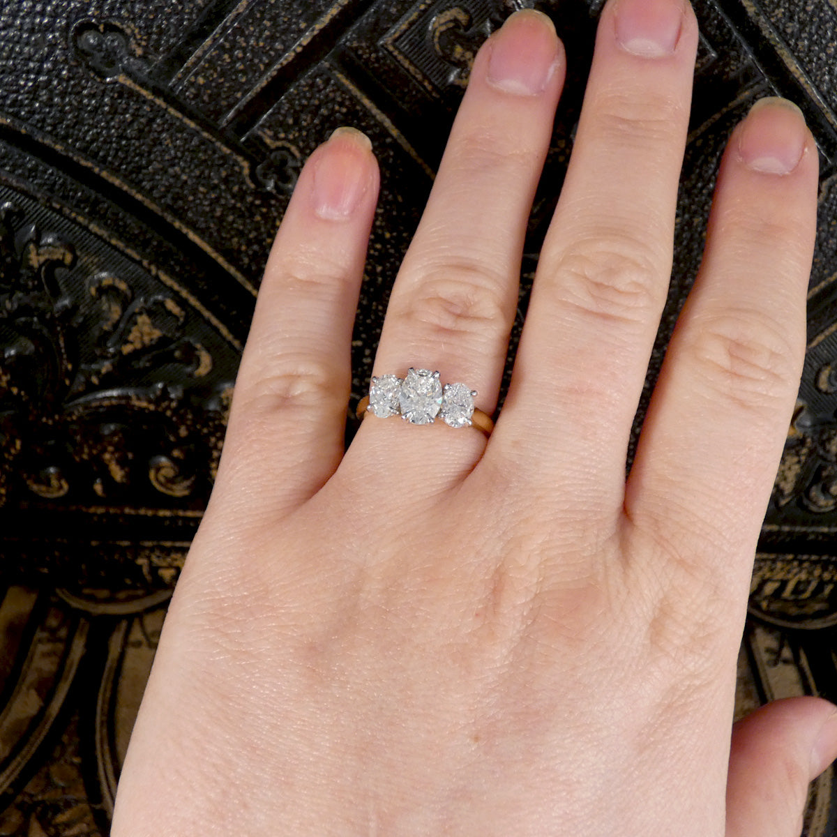 The perfect engagement ring, shown on the finger to see size reference and the beautiful high E/F colour. 