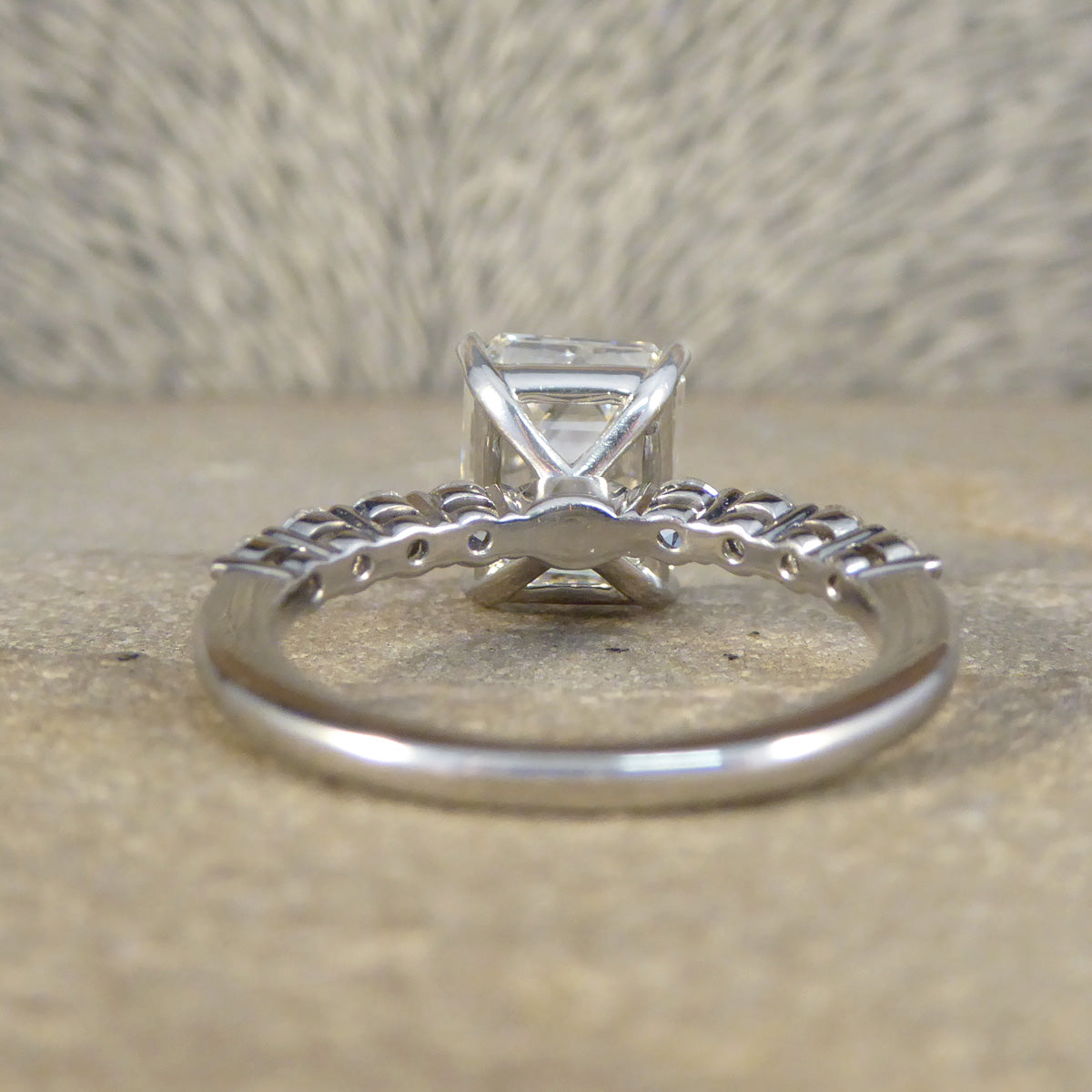 2.60ct Emerald Cut Diamond Solitaire Ring with 0.60ct Diamond Shoulders in Platinum - Wharfedale Antiques