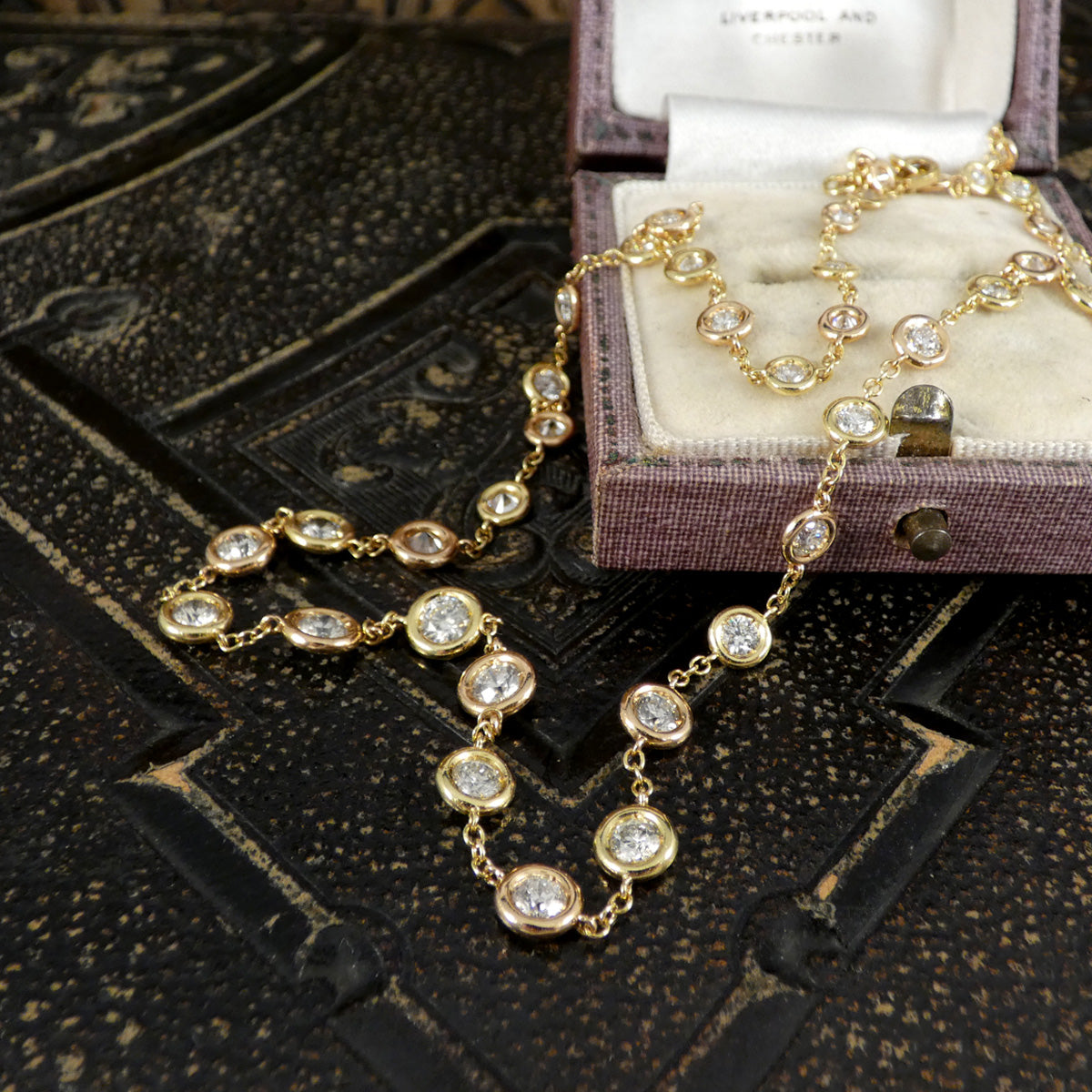 4.55ct Diamond Spectacle Set Spaced Necklace in 18ct Rose and Yellow Gold. Graduating in size and making the perfect gift.