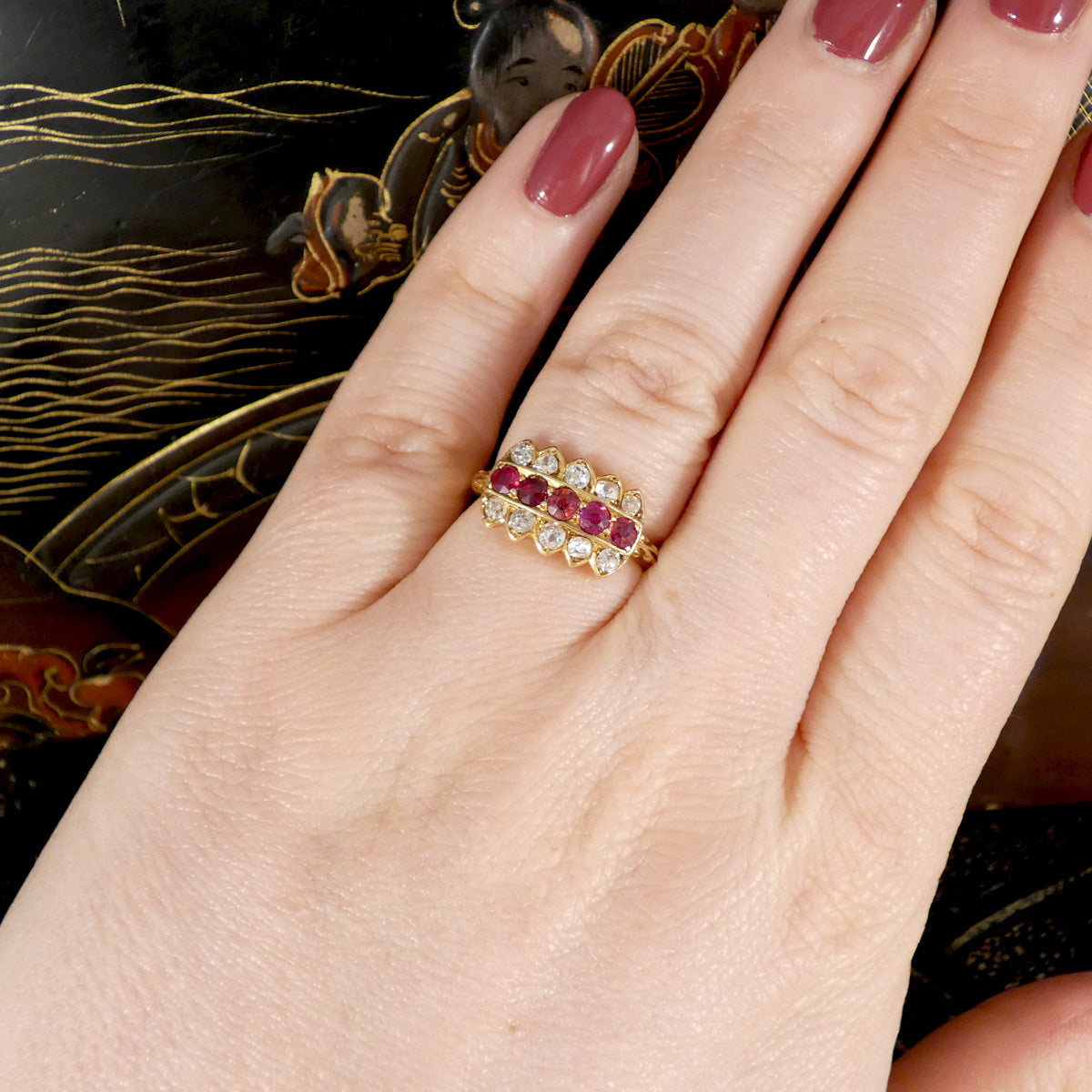 A gorgeous ruby and diamond ring with an unusual and unique design crafted in the late victorian era.