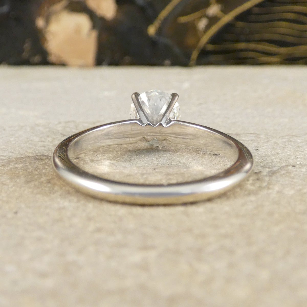 A diamond solitaire high set ring in white gold