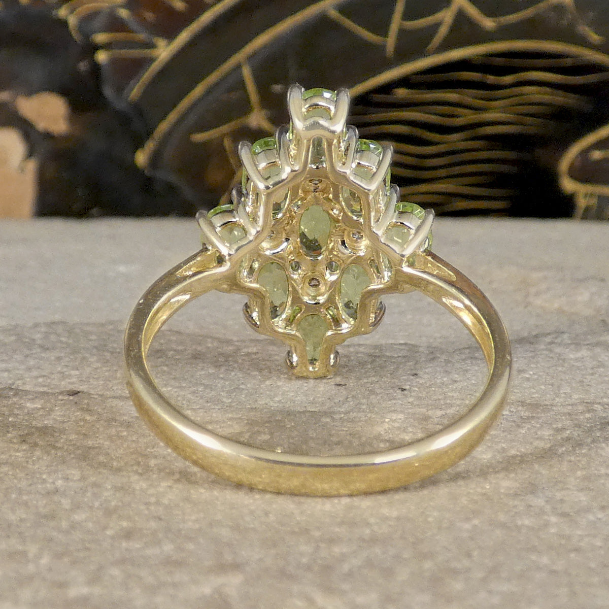 Back view of A bright and beautiful Peridot and Diamond Cluster Cocktail Dress Ring filly set in 9ct Yellow Gold. Showing plain polished band.