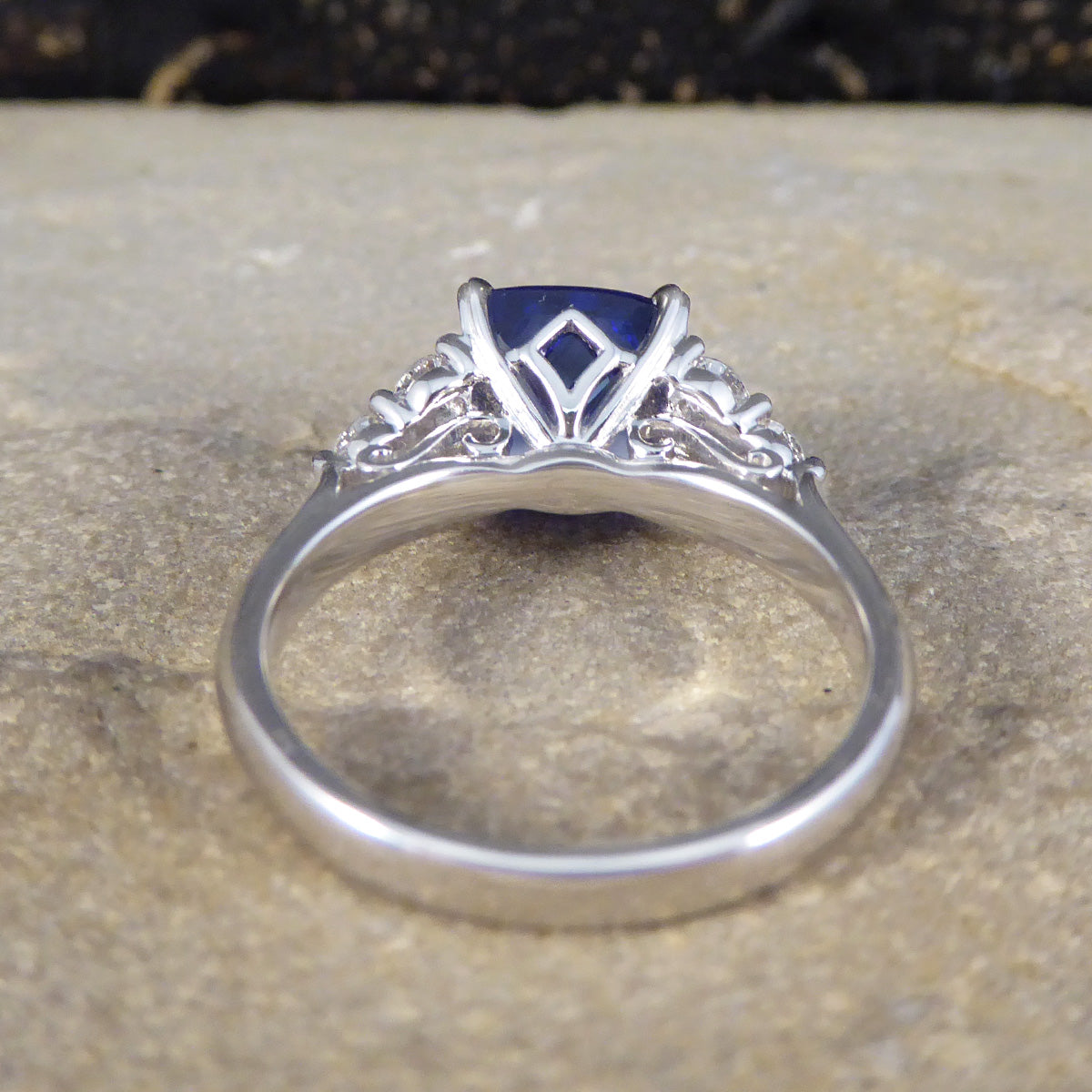 Vibrant 2.40ct Cushion Cut Tanzanite and Diamond Trio Set Shoulders in Platinum - Wharfedale Antiques