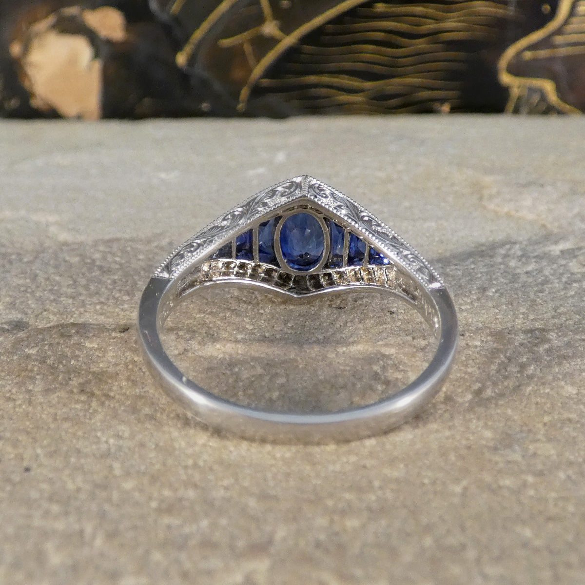 Back view of A gorgeous Art Deco style Sapphire and Diamond cluster ring in Platinum. 