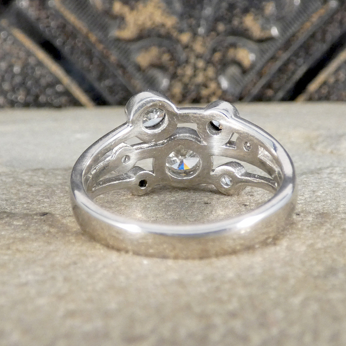 A platinum and diamond bubble ring shown from the back.