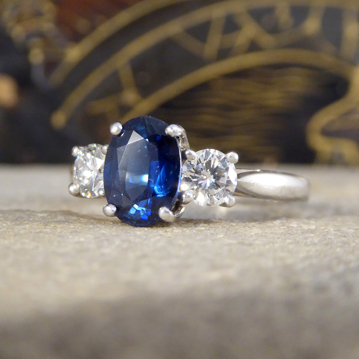 Oval Cut 1.75ct Sapphire and Diamond Three Stone Ring in Platinum - Wharfedale Antiques