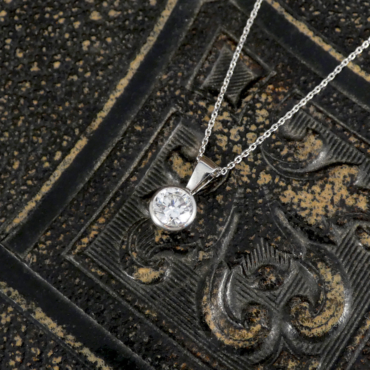 0.69ct Diamond Rub Over Bezel Set GIA F Colour Diamond Necklace in Platinum, the perfect gift.