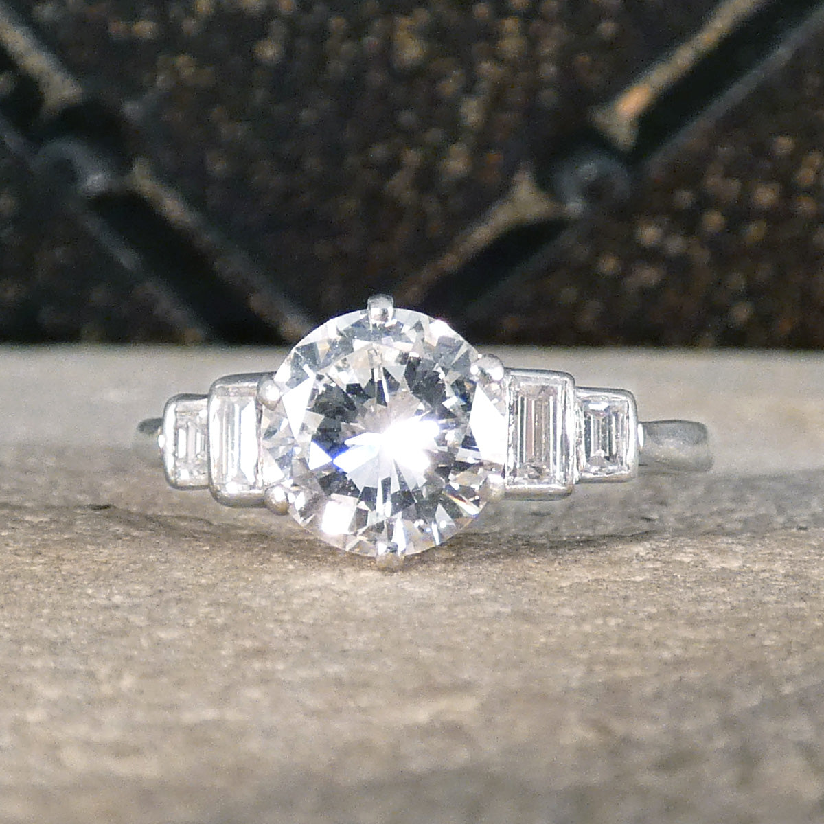 Art Deco 1.20ct Early Brilliant Cut Diamond Solitaire with Baguette Cut Shoulders in Platinum - Wharfedale Antiques