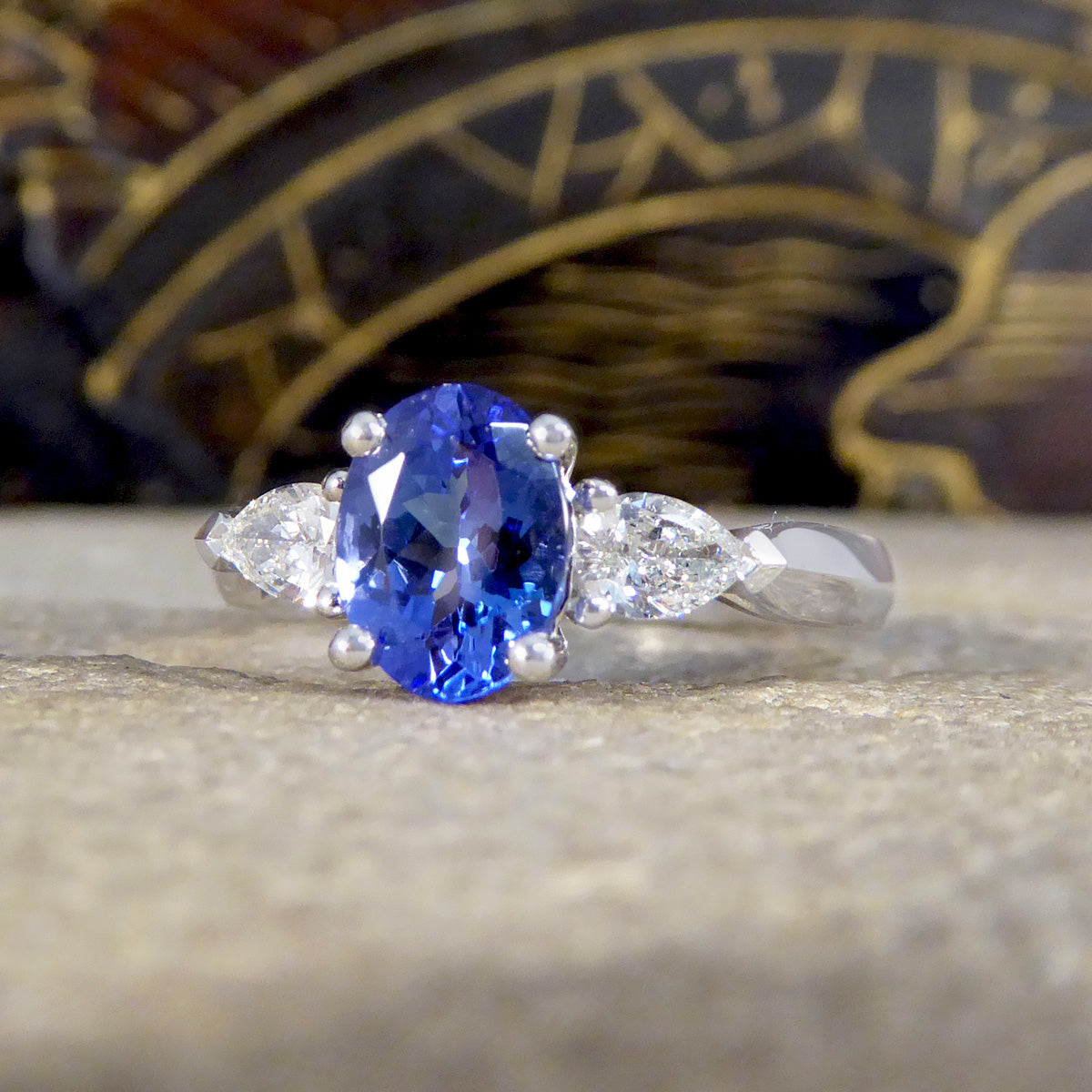 Oval Tanzanite and Pear Cut Diamond Three Stone Ring in Platinum - Wharfedale Antiques