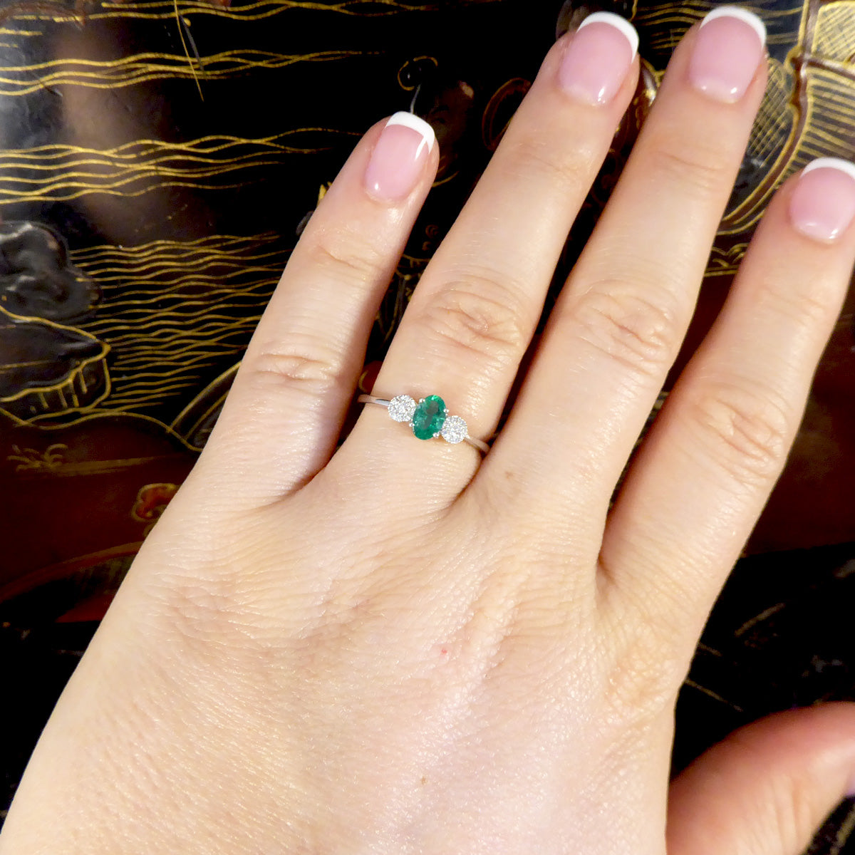 Three emerald ring top