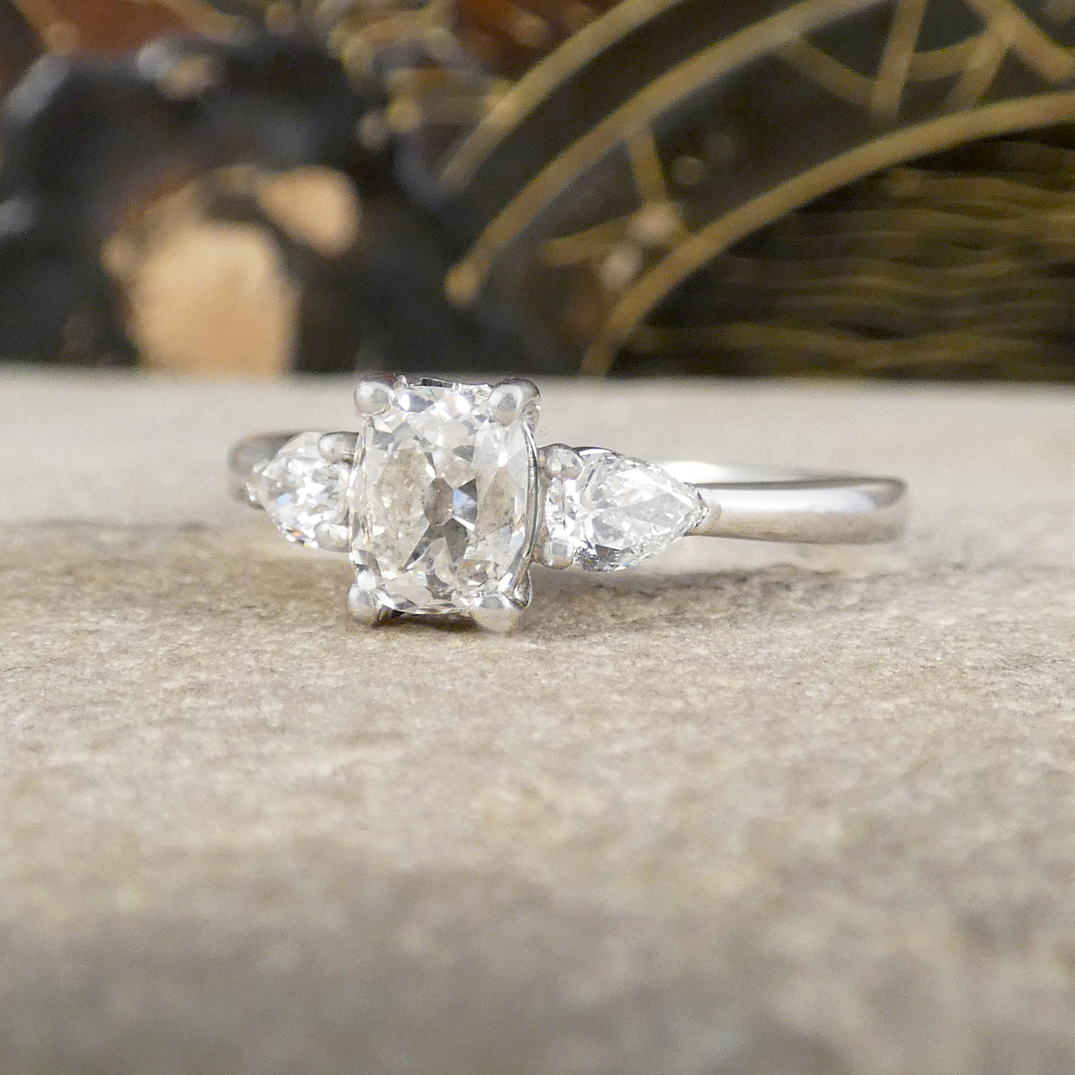 Diamond ring with a blurred decorative background