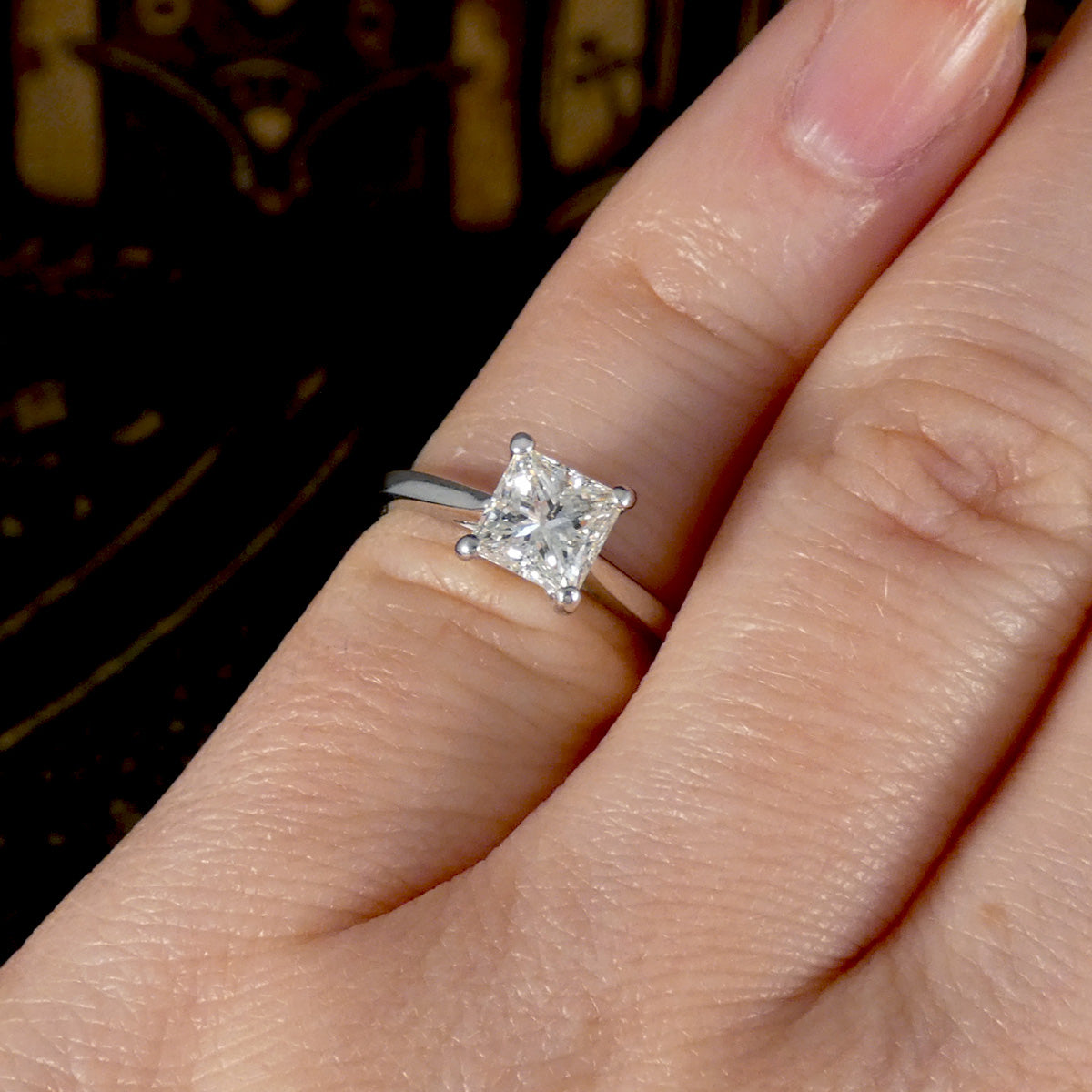 Showing a small finger size with resize options. This ring is shown on the finger to see size and proportion ratio.
