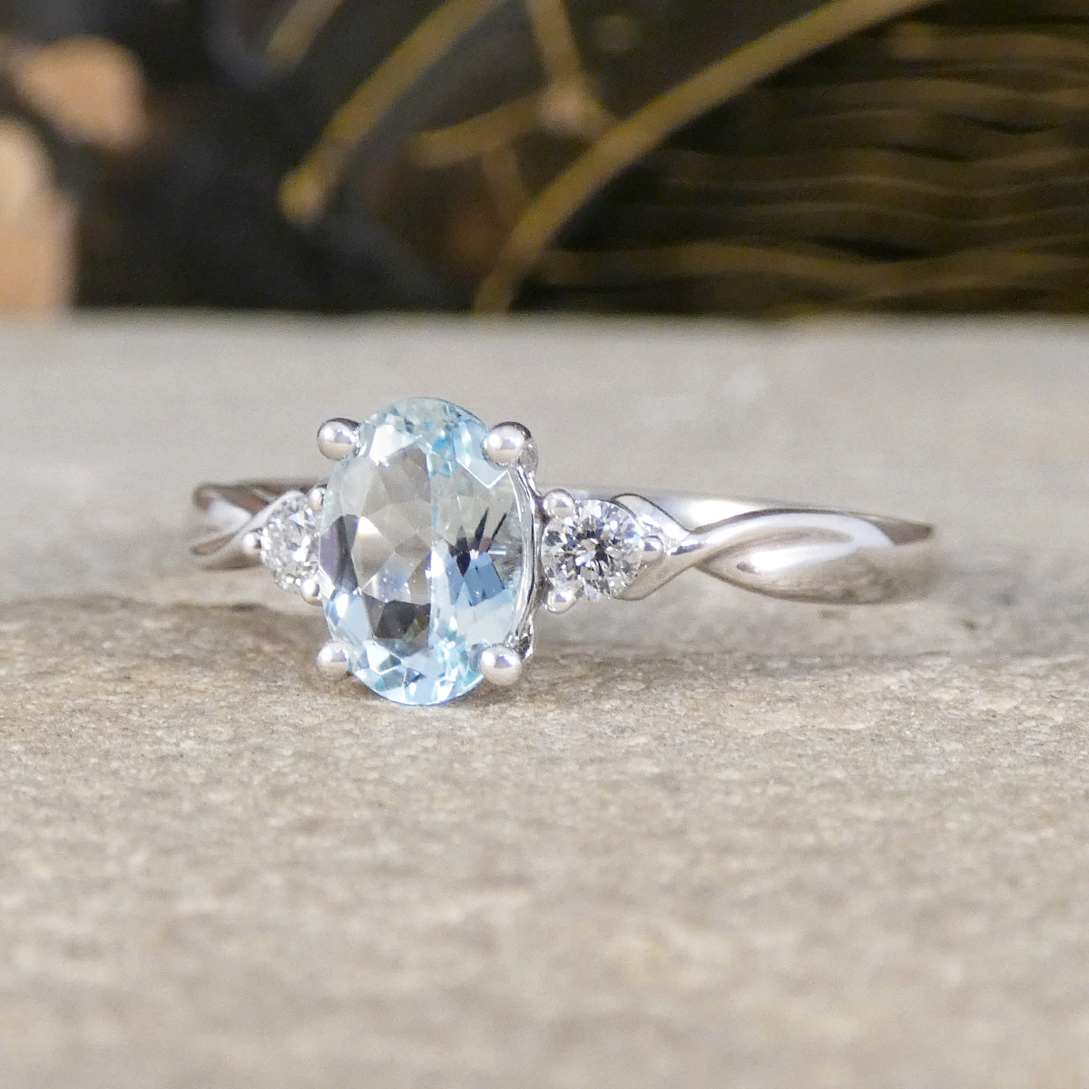 Modern Oval Cut Aquamarine and Brilliant Cut Diamond Three Stone in Platinum