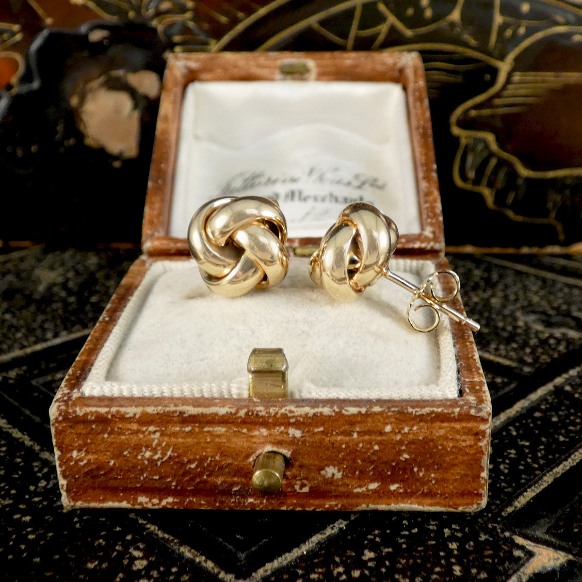 9ct yellow gold knot earrings.