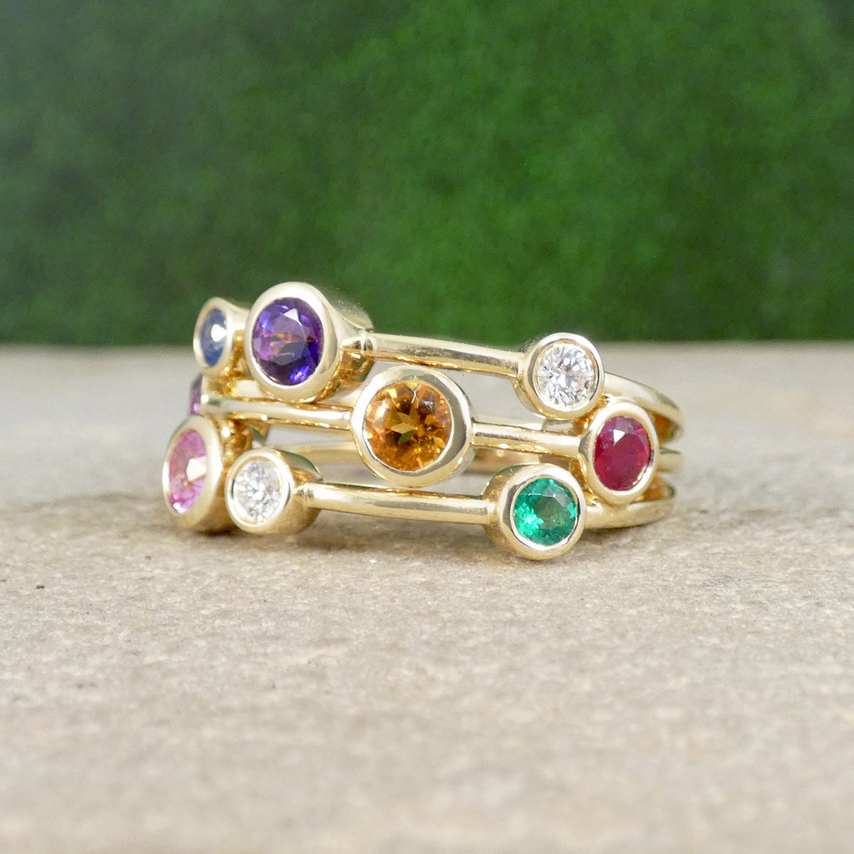 Multi Gem set bubble ring in yellow gold full of colour