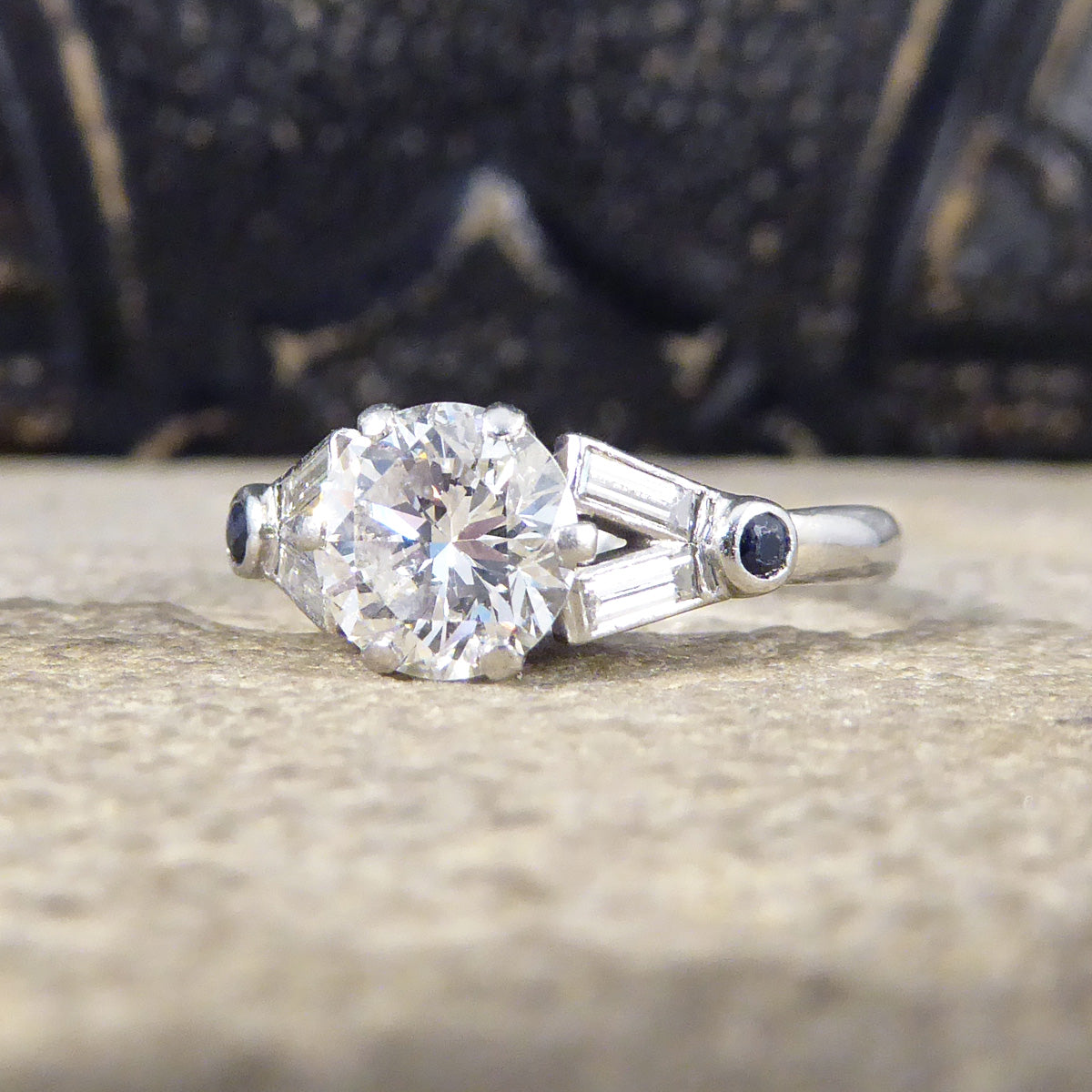 Art Deco 1.10ct Diamond Solitaire Engagement Ring with Diamond and Sapphire Shoulders in Platinum - Wharfedale Antiques