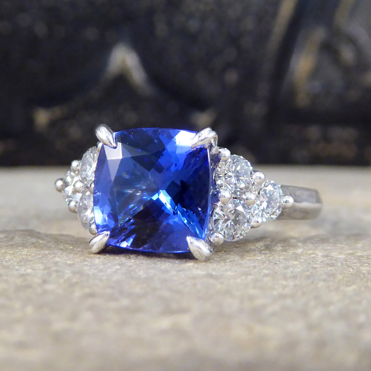 Vibrant 2.40ct Cushion Cut Tanzanite and Diamond Trio Set Shoulders in Platinum - Wharfedale Antiques
