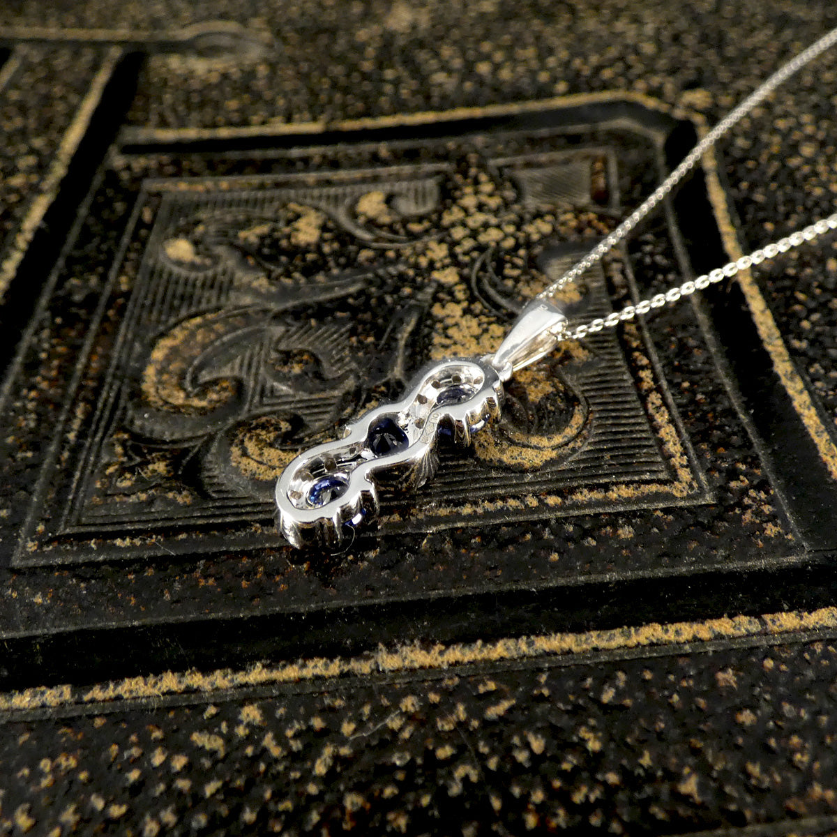 Ceylon Sapphire and Diamond Three Stone Lazy River Drop Pendant Necklace in Platinum - Wharfedale Antiques