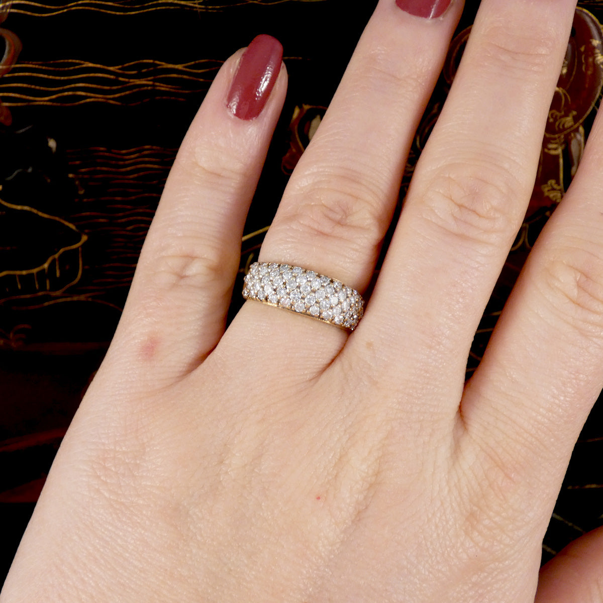 a diamond set ring displayed on the finger