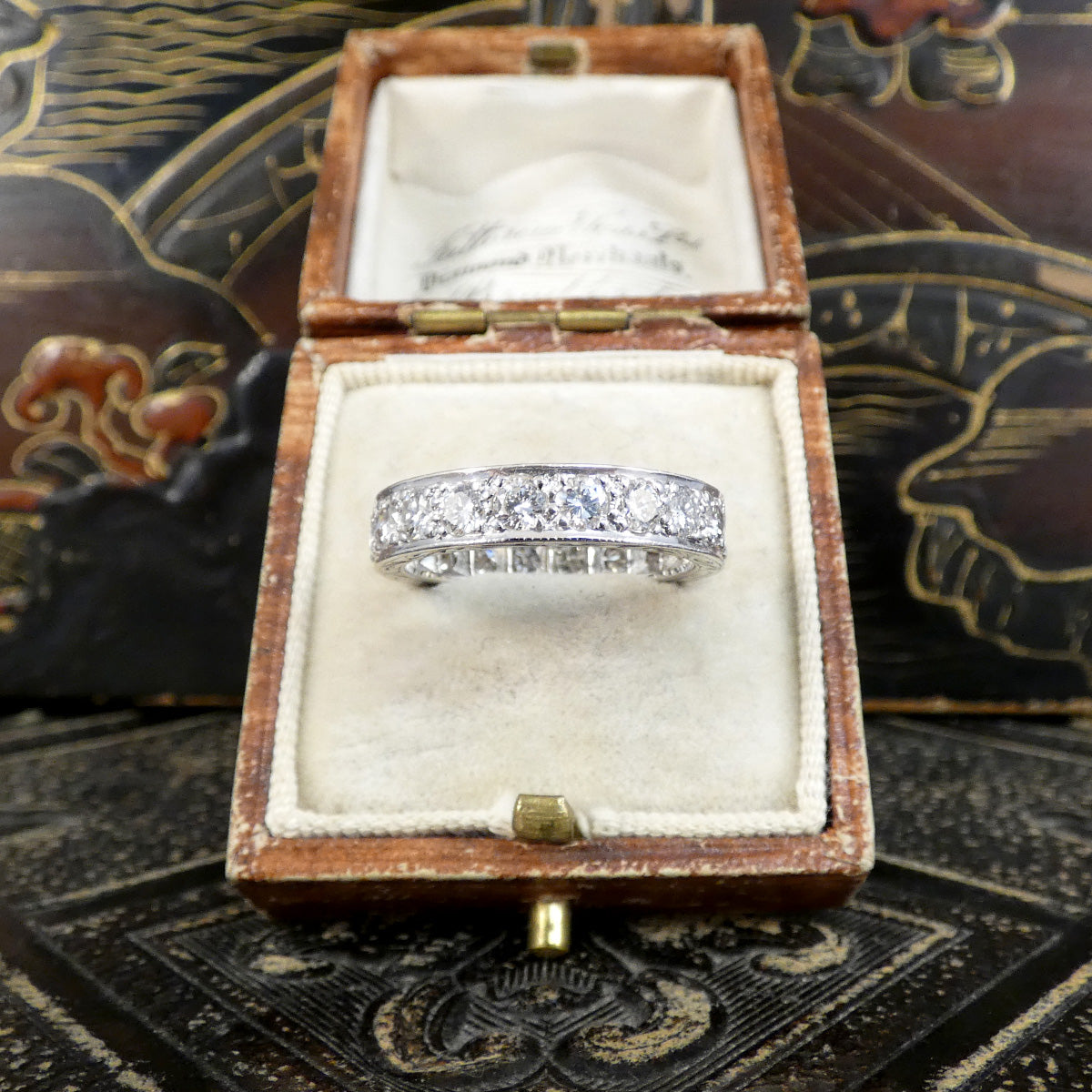 A full diamond eternity ring in 18ct white gold. Displayed in a vintage box.