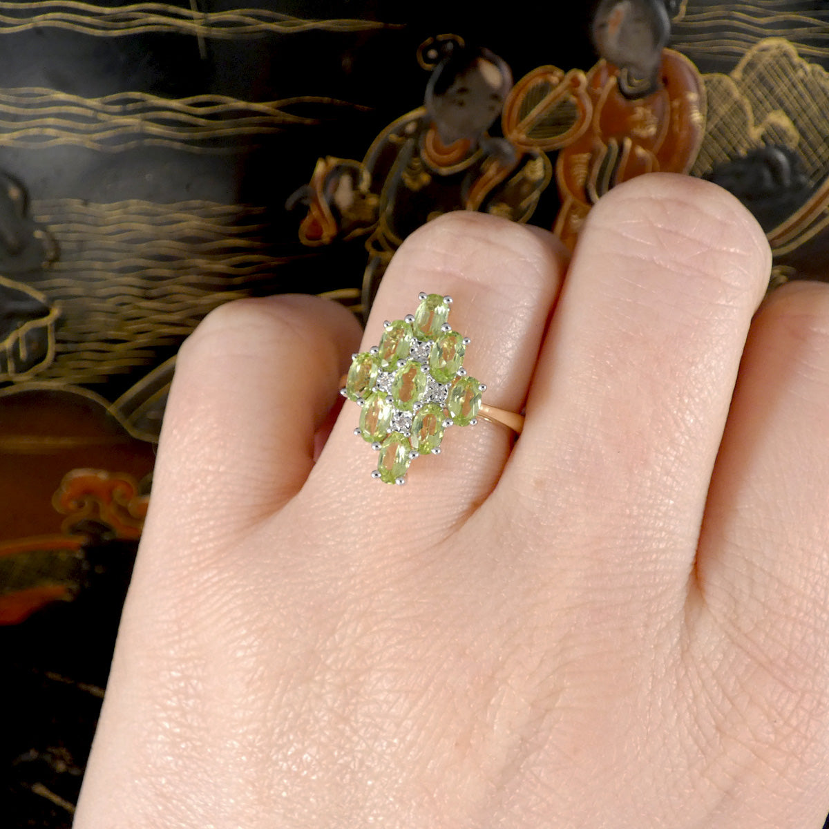 A bright and beautiful Peridot and Diamond Cluster Cocktail Dress Ring filly set in 9ct Yellow Gold shown on finger to see size ratio.
