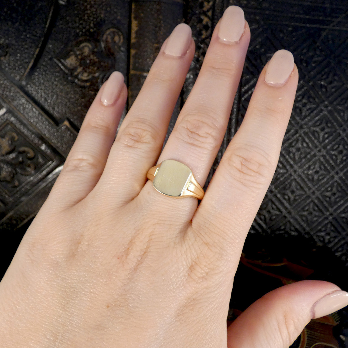 Vintage 18ct Yellow Gold Solid Signet Ring shown on the hand to see size and shape reference.