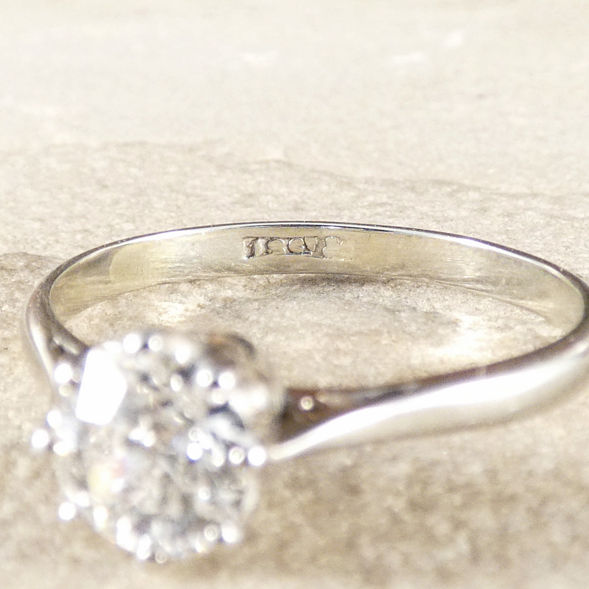 old hallmark for 18ct & PLAT worn in the back of the band.