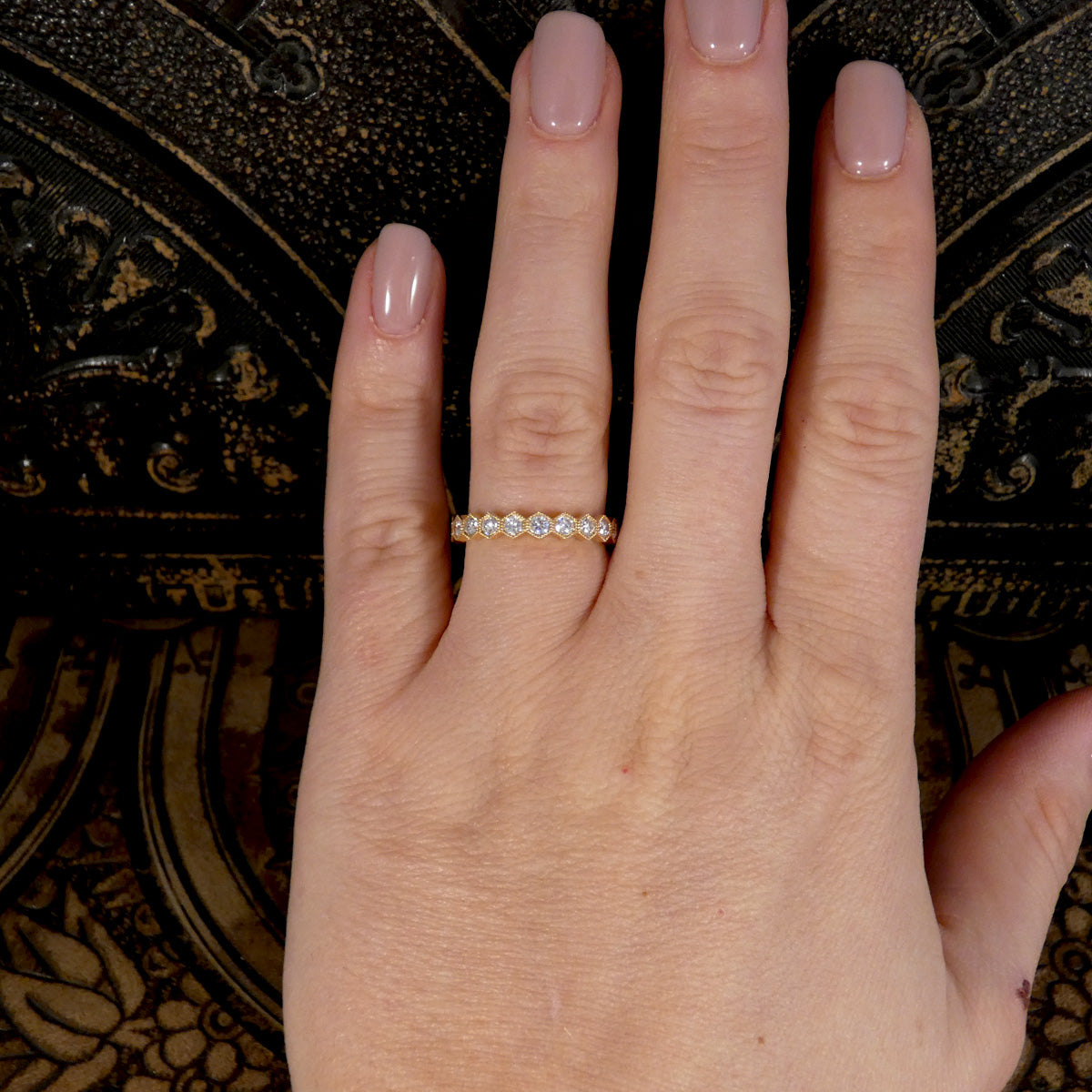 Honeycomb Diamond Half Eternity Ring in 18ct Yellow Gold shown on the hand on the ring finger.