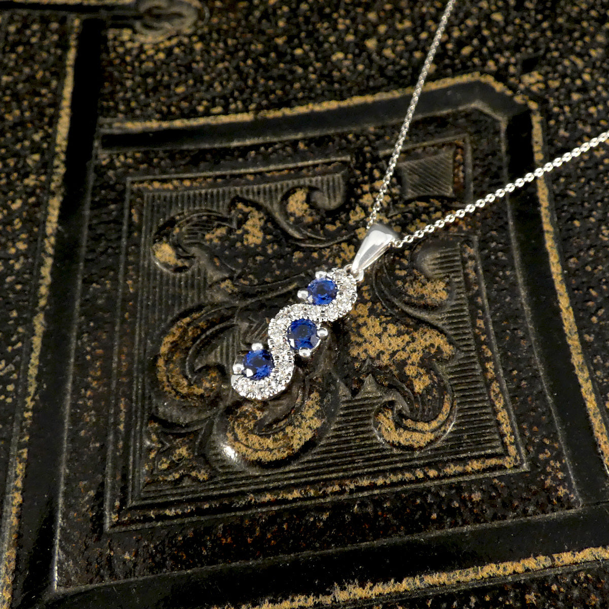 Ceylon Sapphire and Diamond Three Stone Lazy River Drop Pendant Necklace in Platinum - Wharfedale Antiques