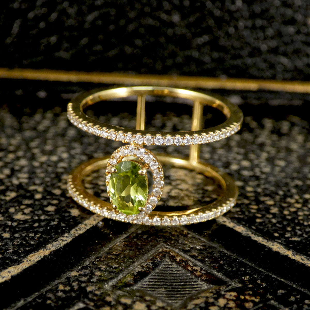 Peridot and Diamond cluster ring with diamond set spacers in 18ct white gold 