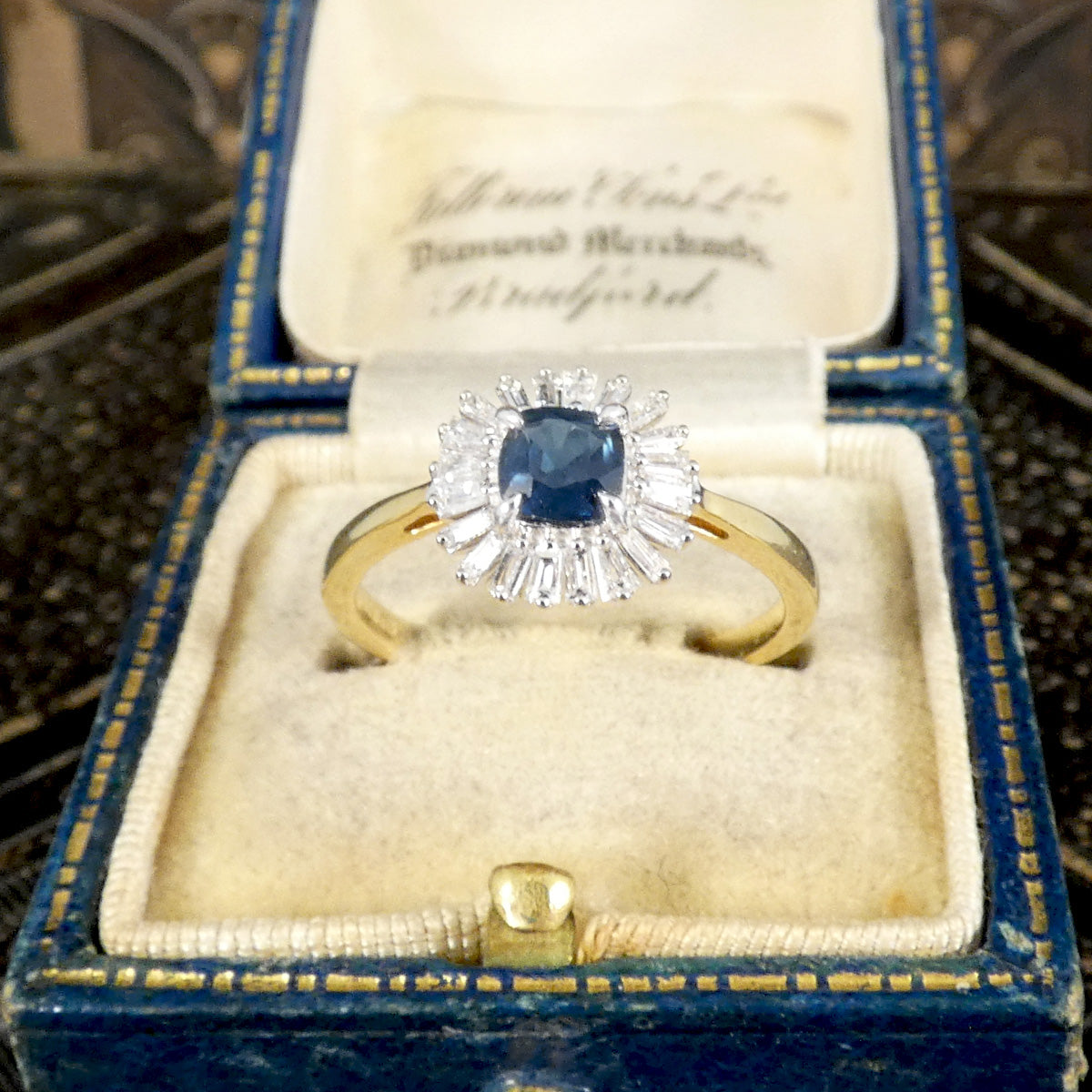 Sapphire and Tapered Baguette Cut Diamond Flower Cluster in 18ct Yellow and White Gold displayed in vintage box.