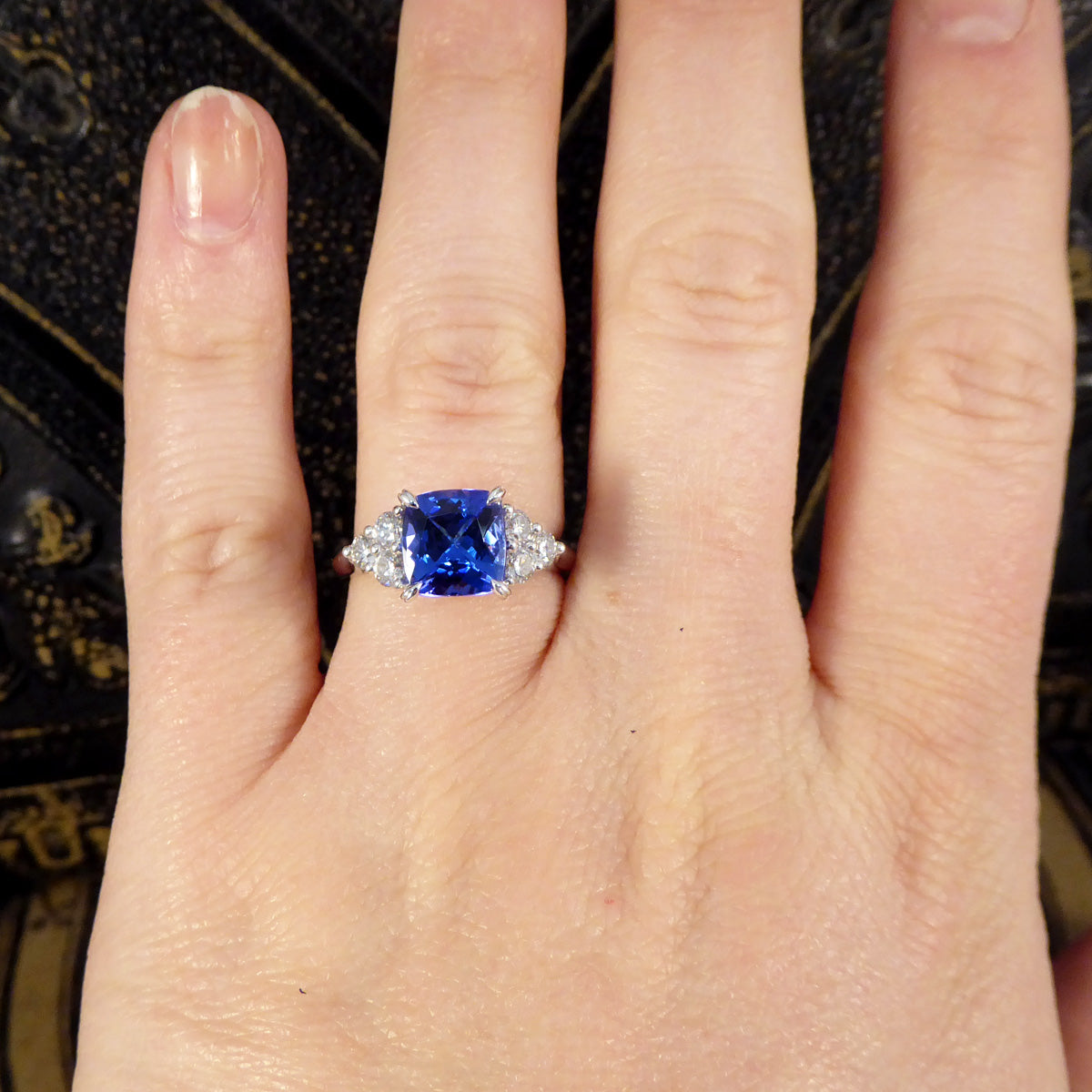 Vibrant 2.40ct Cushion Cut Tanzanite and Diamond Trio Set Shoulders in Platinum - Wharfedale Antiques