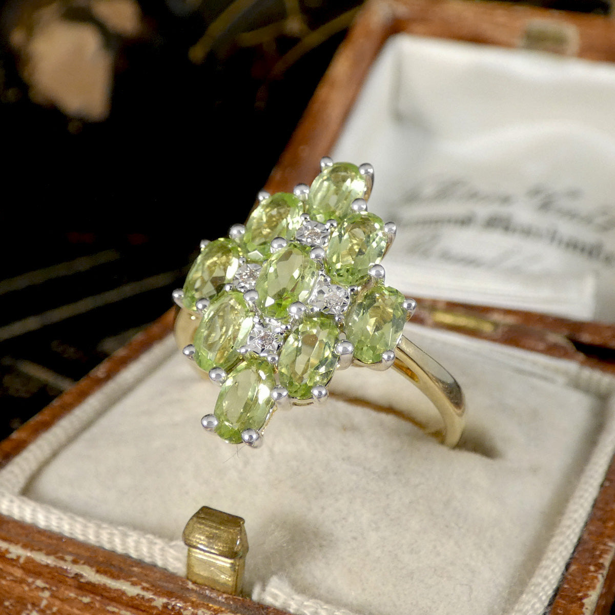 A bright and beautiful Peridot and Diamond Cluster Cocktail Dress Ring filly set in 9ct Yellow Gold. The perfect gift.