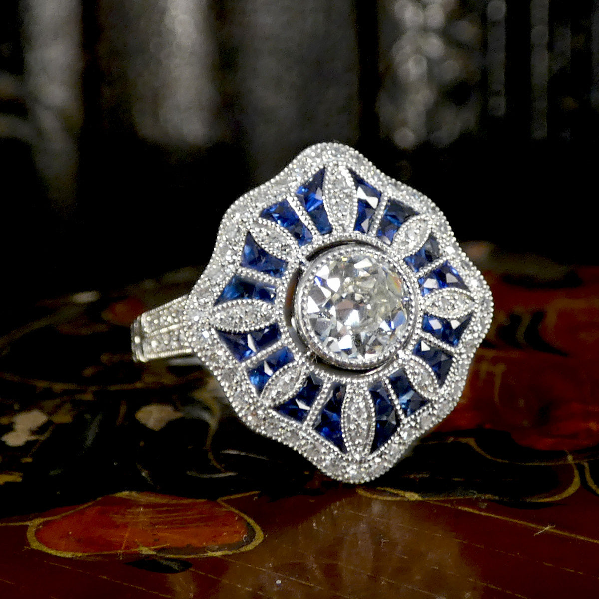 A big and bold with vibrant blue hues in art deco style.