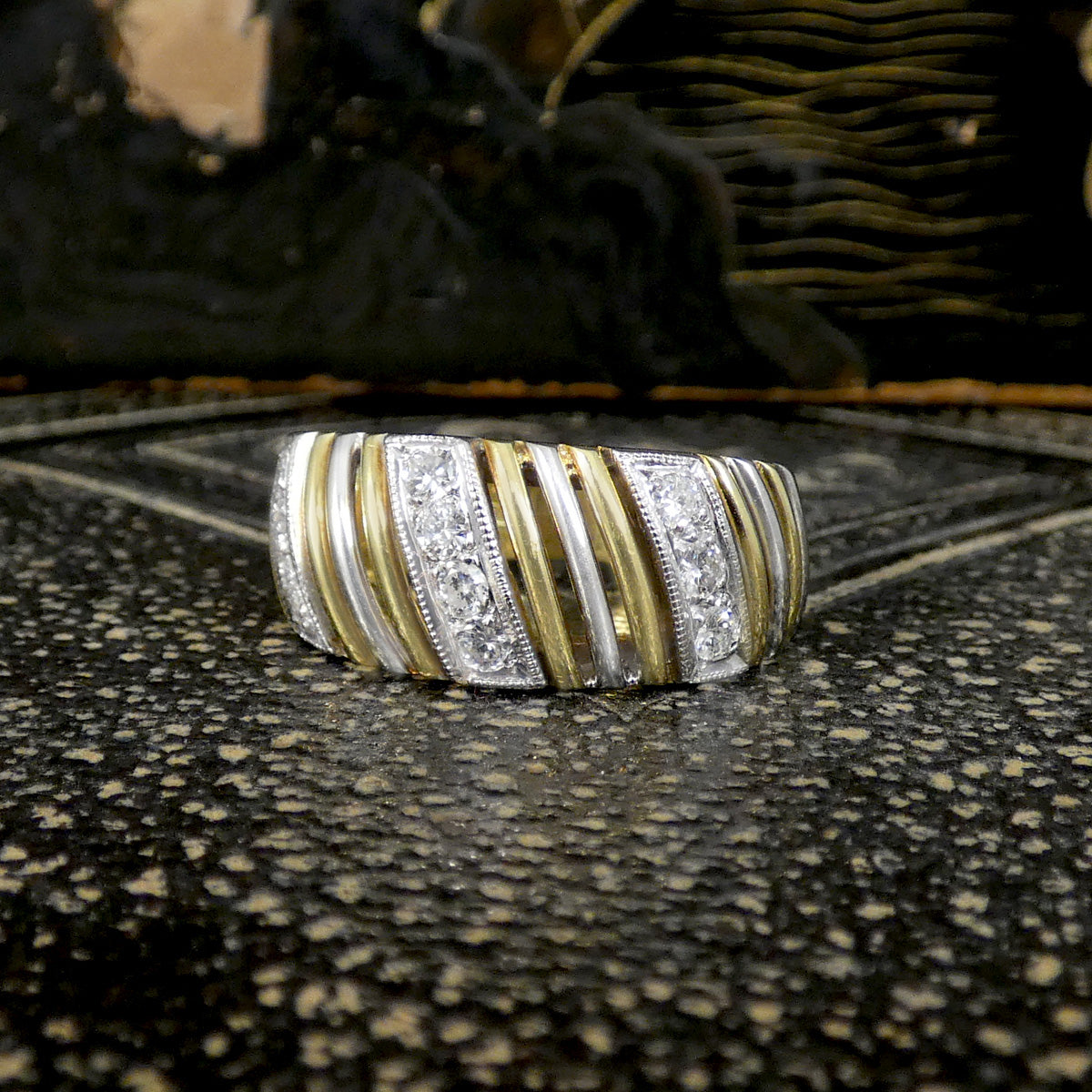 Vintage diamond ring on dark surface 