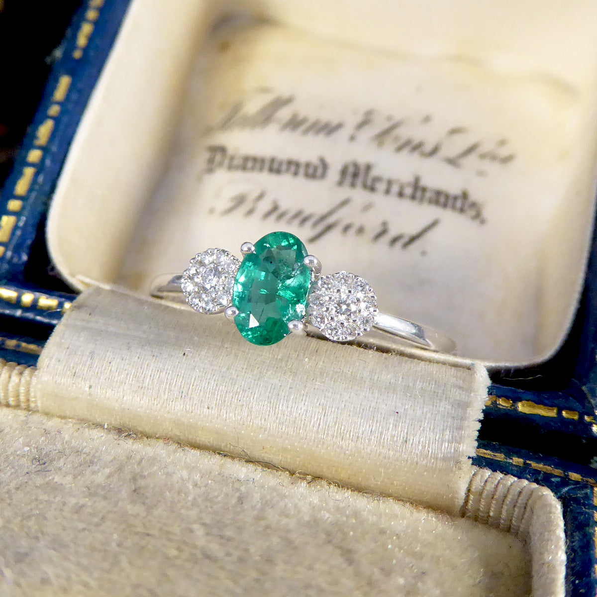 Emerald and Diamond Illusion Three Stone Ring in 18ct White Gold - Wharfedale Antiques