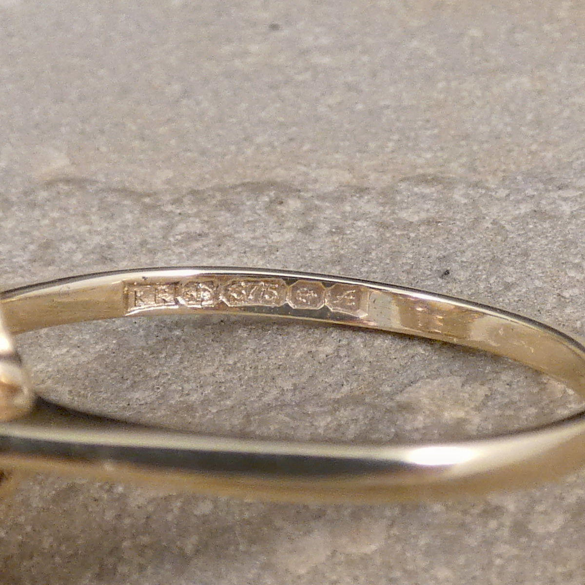 Full Birmingham hallmark on the inner band of the ring showing it has been fully crafted from 9ct yellow gold.