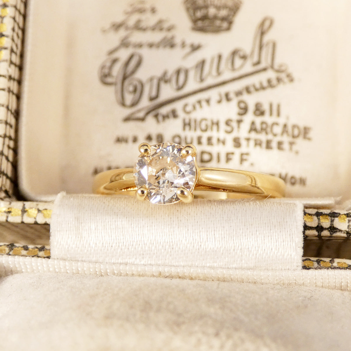 Old European Cut Diamond Solitaire Engagement Ring in Yellow Gold displayed in vintage box.