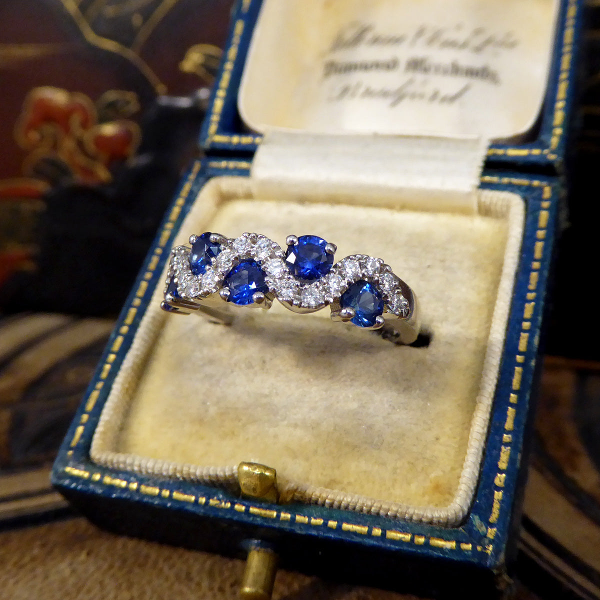 Ceylon Sapphire and Diamond Lazy River Ring in Platinum - Wharfedale Antiques