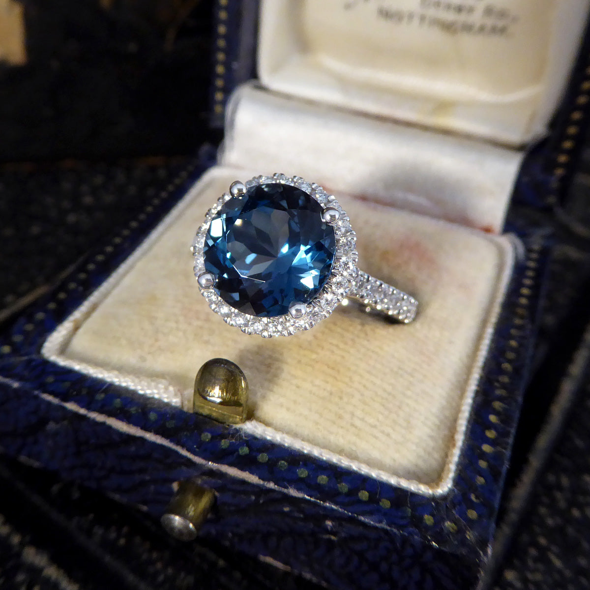 London Blue Topaz and Diamond Halo Cluster Ring in Platinum with Diamond set Shoulders - Wharfedale Antiques