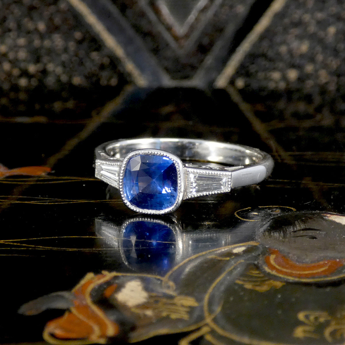 Sapphire and Tapered Baguette Cut Rub Over Set Ring in Platinum., a gorgeous gift.