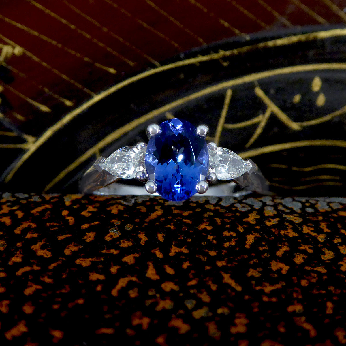 Oval Tanzanite and Pear Cut Diamond Three Stone Ring in Platinum - Wharfedale Antiques