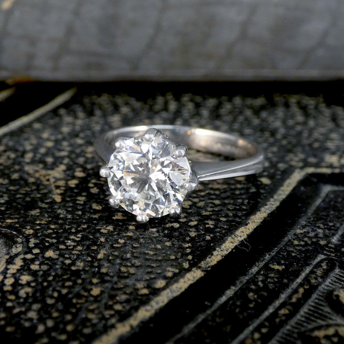 A large diamond solitaire ring in 18ct white gold in a 8 claw setting.