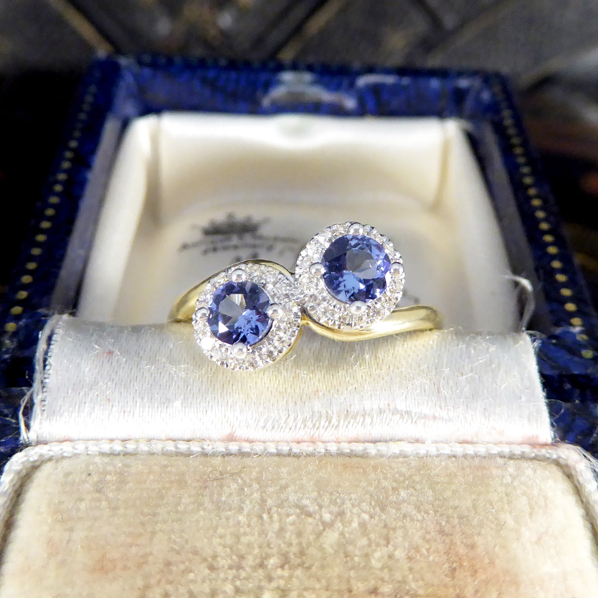 Edwardian Style Tanzanite and Diamond Cluster Toi Et Moi Twist Ring in Yellow and White Gold - Wharfedale Antiques