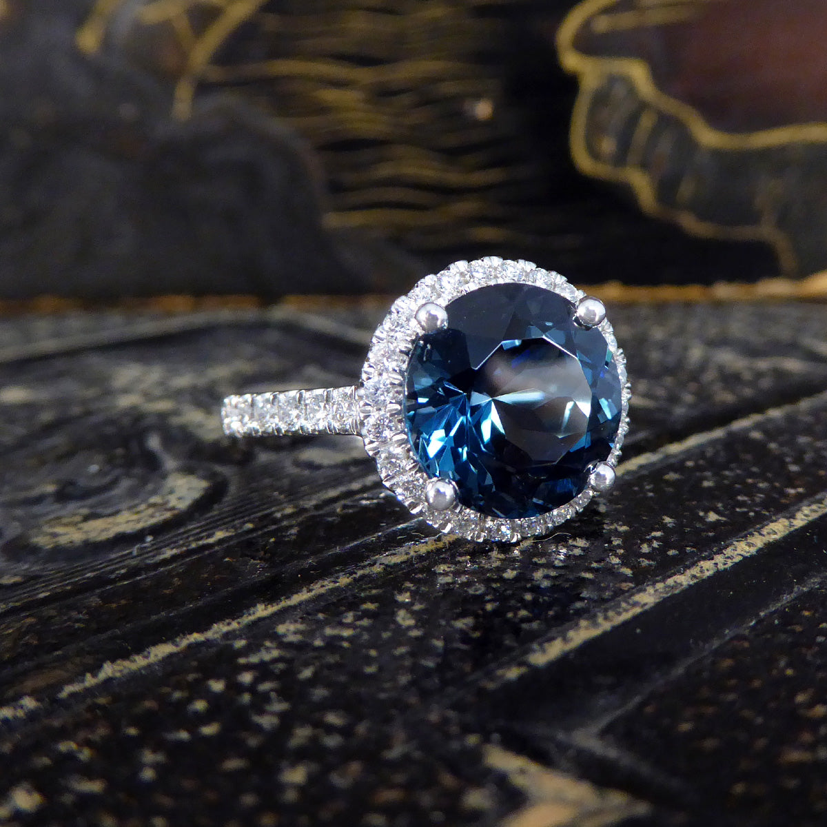 London Blue Topaz and Diamond Halo Cluster Ring in Platinum with Diamond set Shoulders