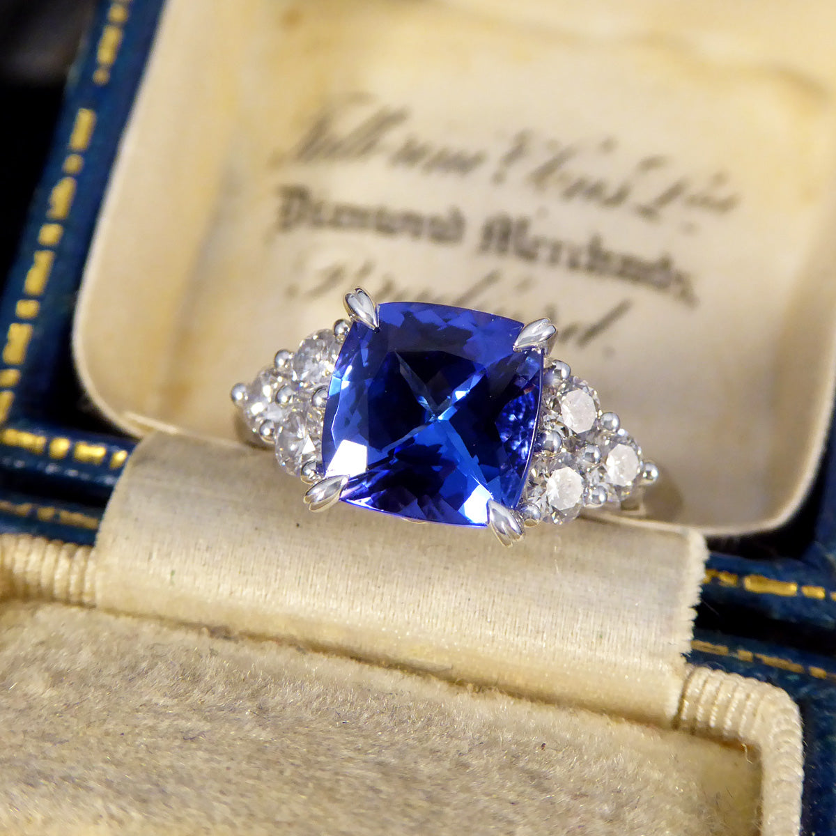 Vibrant 2.40ct Cushion Cut Tanzanite and Diamond Trio Set Shoulders in Platinum - Wharfedale Antiques