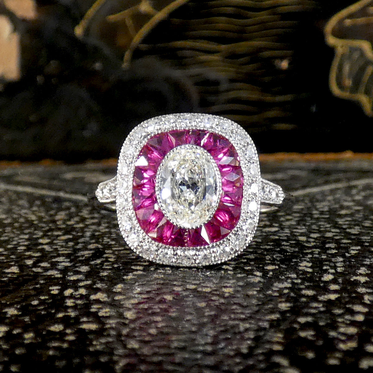 Art Deco Style Ruby and Oval Cut Diamond Target Cluster Ring in Platinum. A beautiful gift.