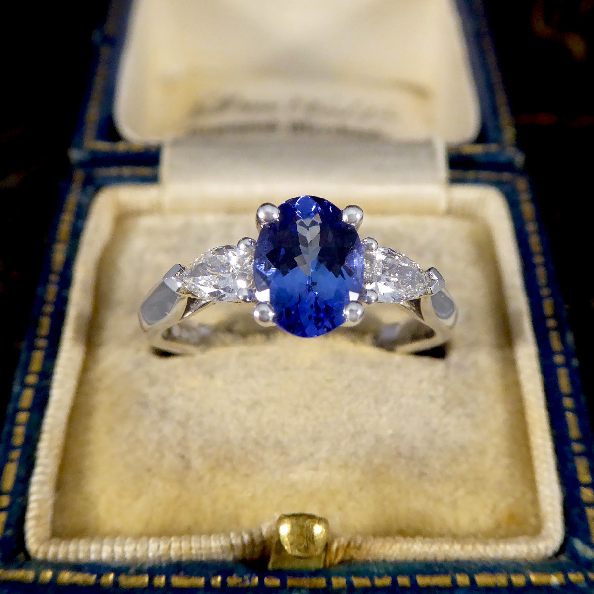 Oval Tanzanite and Pear Cut Diamond Three Stone Ring in Platinum - Wharfedale Antiques