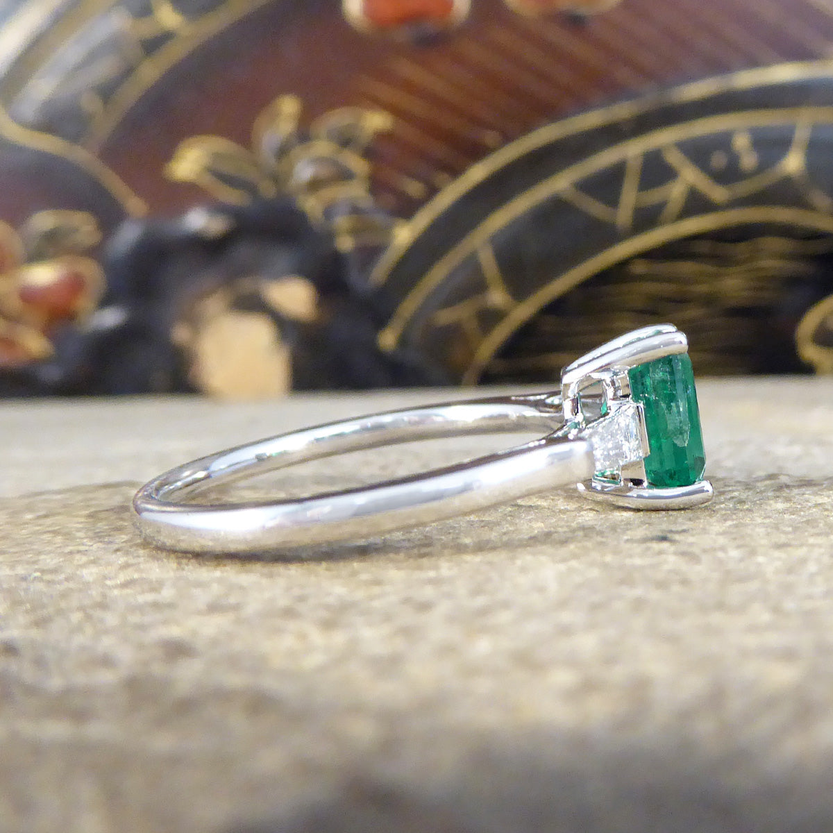 1.03ct Emerald Cut Emerald Ring with Tapered Baguette Cut Diamond Shoulders in Platinum - Wharfedale Antiques